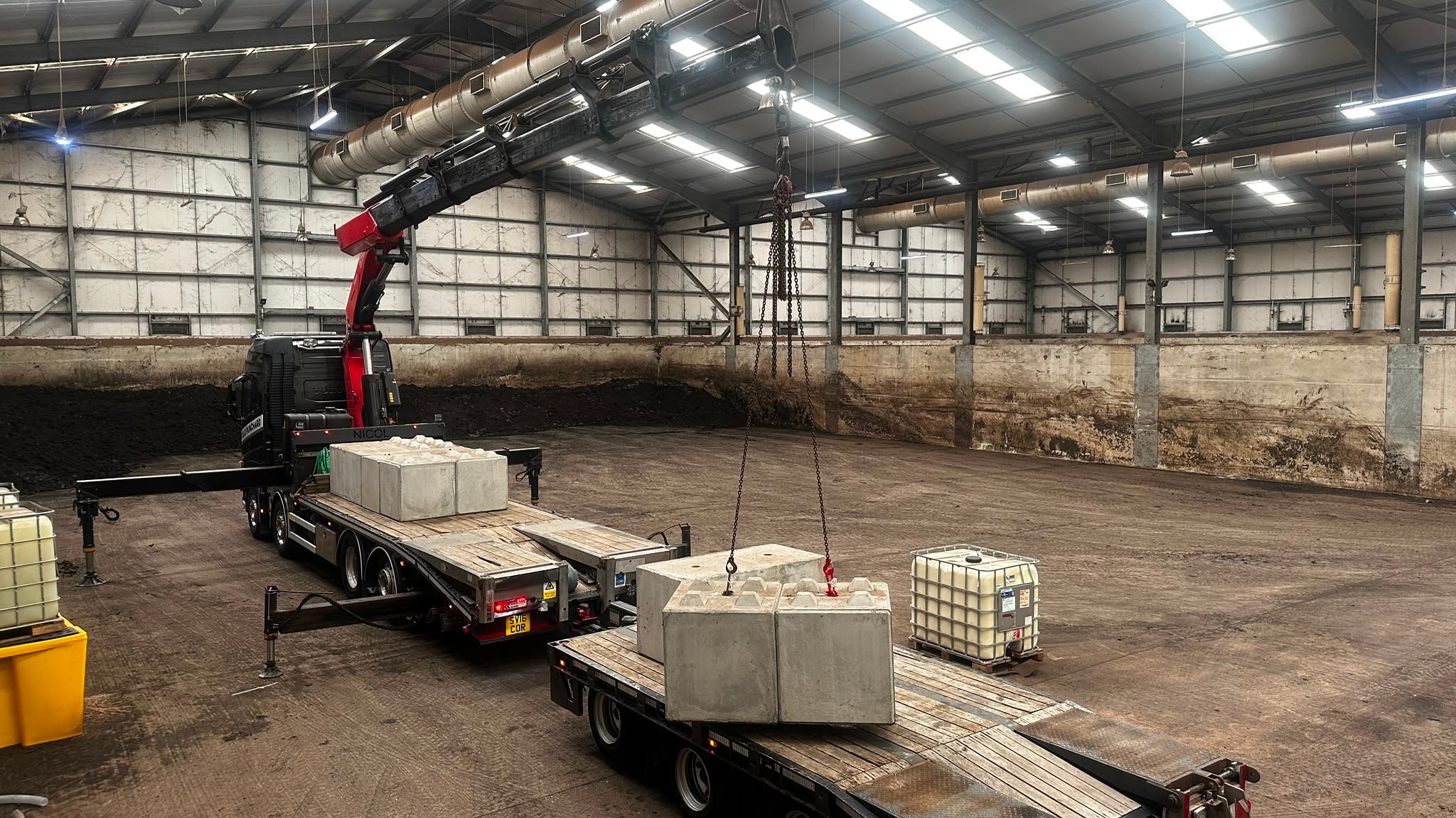 Loader crane operation for industrial transport