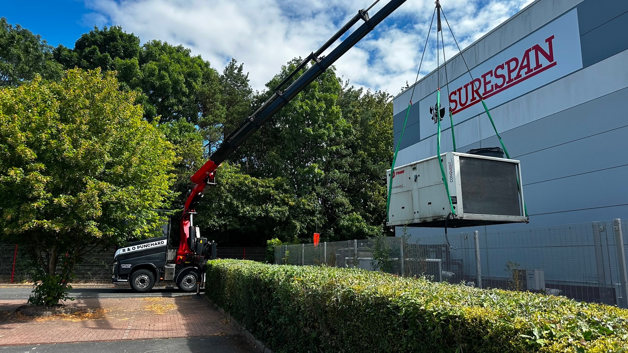 Trane Conquest unit lifted at Surespan